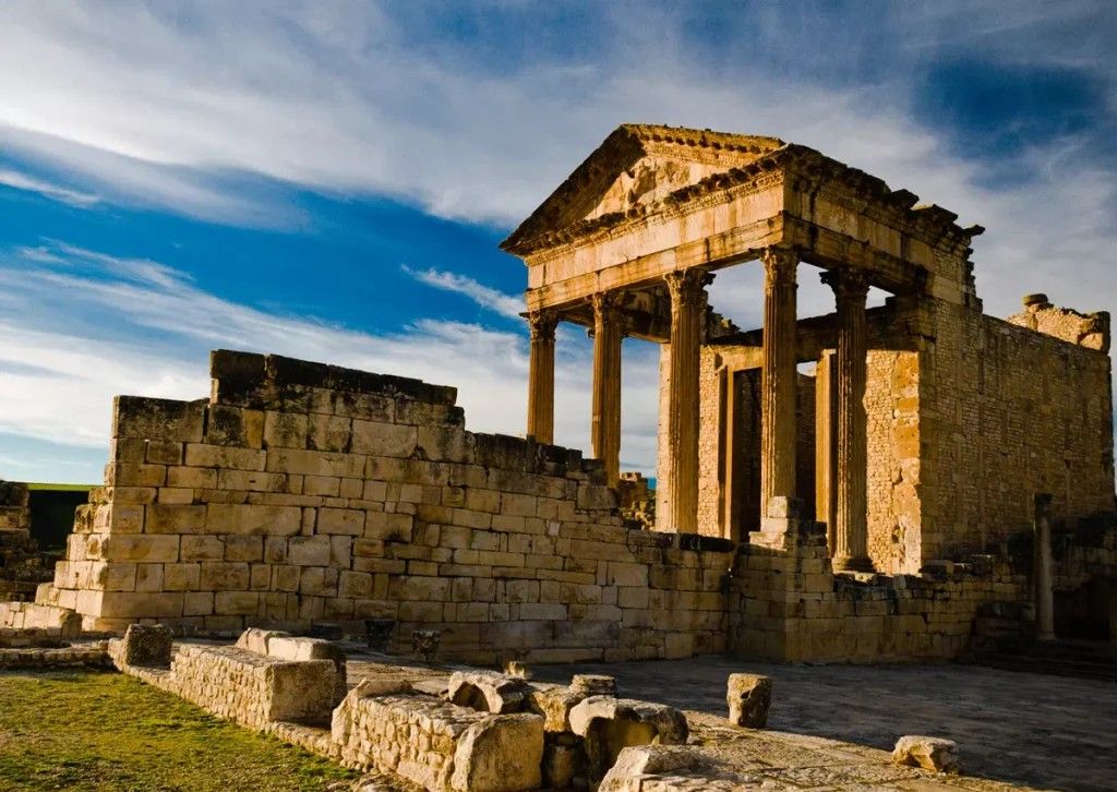 Archaeological site of Dougga in Tunisia, well-preserved Roman ruins listed as a UNESCO World Heritage site.
