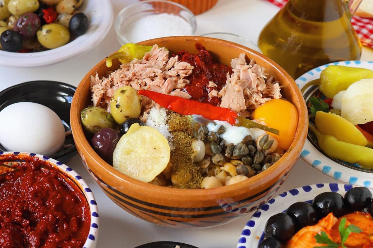 Tunisian lablabi chickpea soup with bread olive oil harissa and egg