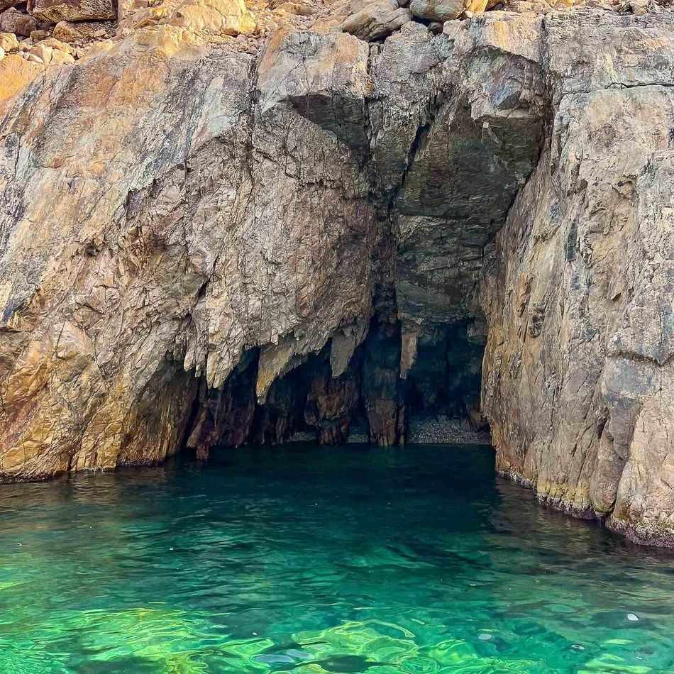 El Mteris Caves and Crique in El Haouaria with limestone cliffs, turquoise Mediterranean waters and hidden sea caves