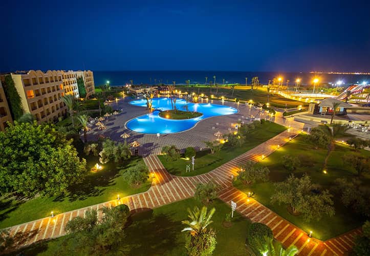 Nour Palace Resort Mahdia exterior and swimming pool at night